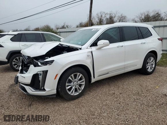 2021 Cadillac XT6 Luxury z VIN 1GYKPAR46MZ132157, wystawiony jako Copart lot #83911054 z przebiegiem 59 473 mil mil oraz Czysty tytuł • Clean title. Historia ofert i sprzedaży dostępna na DreamBid. Obrazek 1.