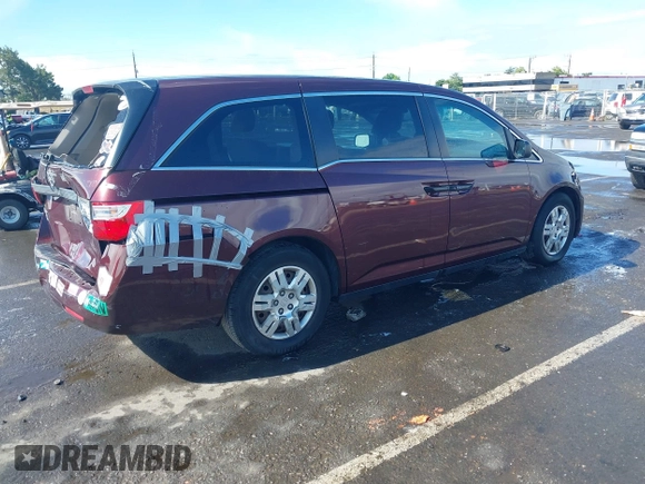 2013 Honda Odyssey LX z VIN 5FNRL5H25DB058422, wystawiony jako IAAI lot #42247200 z przebiegiem 137 053 mil mil oraz . Historia ofert i sprzedaży dostępna na DreamBid. Obrazek 4.