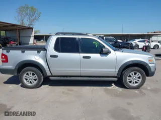 2010 Ford Explorer Sport Trac XLT with VIN 1FMEU3BE2AUA00236, listed as a IAAI auction lot 41981531 with 101,993 mi miles. Bid and sale history available at carsss.com. Image 14.