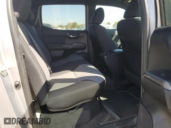 2021 Toyota Tacoma 4WD SR5 with VIN 3TMDZ5BN9MM099787, listed as a Copart auction lot 49717425 with 56,374 mi miles and Salvage Title. Bid and sale history available at carsss.com. Image 10.