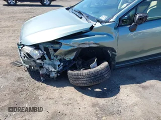 2015 Subaru Impreza Premium z VIN JF1GPAC64FH212027, wystawiony jako IAAI lot #41995629 z przebiegiem 161 006 mil mil oraz . Historia ofert i sprzedaży dostępna na DreamBid. Obrazek 6.