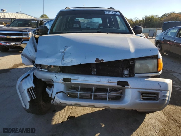 1998 Isuzu Rodeo S with VIN 4S2CM58W7W4323393, listed as a Copart auction lot 77571224 with 261,881 mi miles and Clean Title. Bid and sale history available at carsss.com. Image 5.