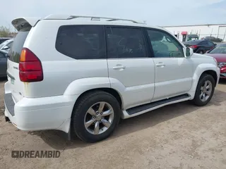 2004 Lexus GX 470 with VIN JTJBT20X440062559, listed as a IAAI auction lot 42142442 with 261,126 mi miles. Bid and sale history available at carsss.com. Image 13.