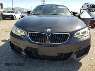 2015 BMW 2 Series M235i with VIN WBA1M1C56FV393730, listed as a Copart auction lot 45348734 with 59,231 mi miles and Salvage title. Bid and sale history available at DreamBid. Image 5.