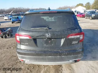 2019 Honda Pilot Touring 7-Passenger with VIN 5FNYF6H65KB061796, listed as a IAAI auction lot 41650857 with 122,417 mi miles. Bid and sale history available at carsss.com. Image 16.
