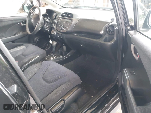 2013 Honda Fit Sport с VIN JHMGE8H59DC042068, выставлен на аукционе IAAI как лот 41803884 с пробегом 128 223 миль миль и . История ставок и продаж доступна на DreamBid. Изображение 5.