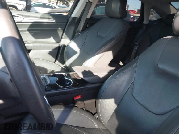 2016 Ford Fusion Titanium Hybrid with VIN 3FA6P0RU1GR259947, listed as a IAAI auction lot 41695377 with 97,605 mi miles. Bid and sale history available at carsss.com. Image 19.