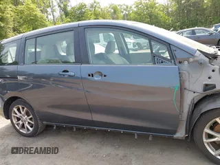 2012 Mazda 5 Touring z VIN JM1CW2CL5C0126744, wystawiony jako IAAI lot #42385667 z przebiegiem 140 150 mil mil oraz . Historia ofert i sprzedaży dostępna na DreamBid. Obrazek 13.