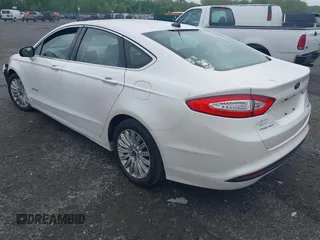 2014 Ford Fusion SE Hybrid с VIN 3FA6P0LUXER125766, выставлен на аукционе IAAI как лот 42178177 с пробегом 284 385 миль миль и . История ставок и продаж доступна на DreamBid. Изображение 3.