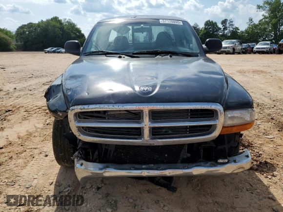 2001 Dodge Dakota z VIN 1B7GL22X81S204868, wystawiony jako Copart lot #57178895 z przebiegiem 298 667 mil mil oraz Szkoda całkowita • Salvage title. Historia ofert i sprzedaży dostępna na DreamBid. Obrazek 5.