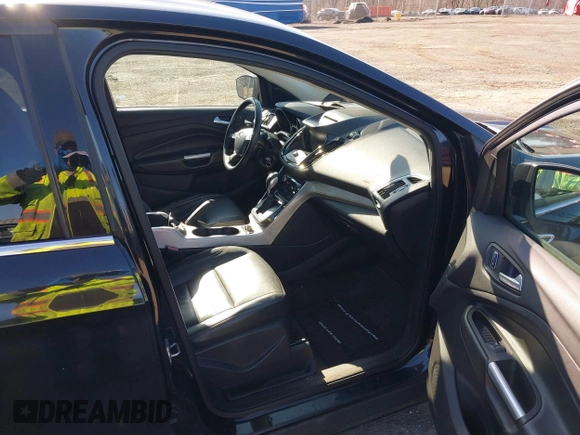 2013 Ford Escape SEL with VIN 1FMCU9HX5DUC58726, listed as a IAAI auction lot 41766493 with 219,093 mi miles. Bid and sale history available at carsss.com. Image 5.
