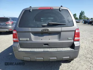 2011 Ford Escape XLT z VIN 1FMCU9DG7BKC39271, wystawiony jako Copart lot #55880445 z przebiegiem 202 072 mil mil oraz Szkoda całkowita • Salvage title. Historia ofert i sprzedaży dostępna na DreamBid. Obrazek 6.