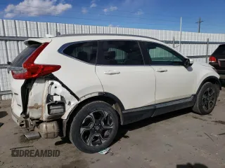 2018 Honda CR-V Touring with VIN 5J6RW2H95JL030237, listed as a Copart auction lot 44001415 with 55,575 mi miles and Salvage Title. Bid and sale history available at DreamBid. Image 3.