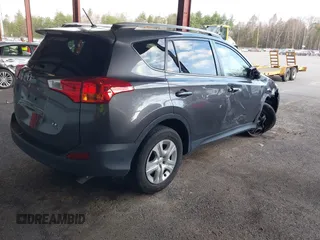 2015 Toyota RAV4 LE with VIN JTMBFREV0FJ044955, listed as a IAAI auction lot 41965740 with 119,311 mi miles. Bid and sale history available at carsss.com. Image 4.