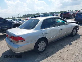 2002 Honda Accord LX z VIN JHMCG56462C005400, wystawiony jako IAAI lot #41893400 z przebiegiem Nie podano mil oraz . Historia ofert i sprzedaży dostępna na DreamBid. Obrazek 4.