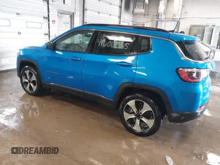 2020 Jeep Compass Latitude with VIN 3C4NJDBBXLT104849, listed as a IAAI auction lot 41606035 with 116,706 mi miles. Bid and sale history available at carsss.com. Image 3.