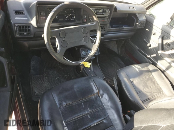 1982 Volkswagen Rabbit z VIN WVWCA0153CK006047, wystawiony jako Copart lot #74948744 z przebiegiem 127 659 mil mil oraz Szkoda całkowita • Salvage title. Historia ofert i sprzedaży dostępna na DreamBid. Obrazek 8.