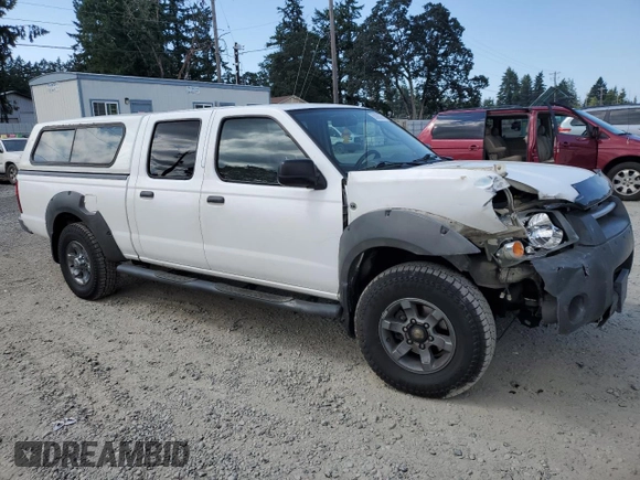 2003 Nissan Frontier XE with VIN 1N6ED29X13C419979, listed as a Copart auction lot 65806585 with 167,535 mi miles and Salvage title. Bid and sale history available at DreamBid. Image 4.