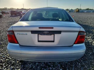 2007 Ford Focus S with VIN 1FAFP34N87W278008, listed as a Copart auction lot 61022545 with 139,575 mi miles and Salvage title. Bid and sale history available at DreamBid. Image 6.