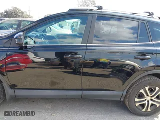 2018 Toyota RAV4 LE with VIN 2T3ZFREVXJW457751, listed as a IAAI auction lot 41529251 with 230,054 mi miles. Bid and sale history available at carsss.com. Image 15.