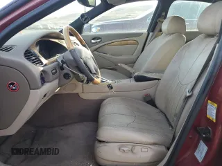 2000 Jaguar S-Type V8 z VIN SAJDA01D7YGL57521, wystawiony jako Copart lot #84539364 z przebiegiem Nie podano mil oraz Szkoda całkowita • Salvage title. Historia ofert i sprzedaży dostępna na DreamBid. Obrazek 7.