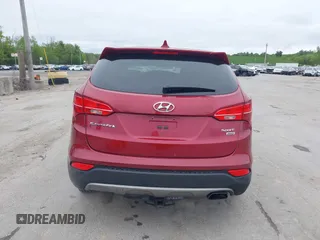 2016 Hyundai Santa Fe z VIN 5XYZTDLBXGG353241, wystawiony jako IAAI lot #42328420 z przebiegiem 120 925 mil mil oraz . Historia ofert i sprzedaży dostępna na DreamBid. Obrazek 16.