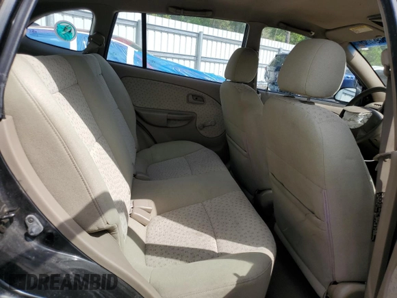 2003 Kia Rio with VIN KNADC165036169340, listed as a Copart auction lot 51538975 with 136,054 mi miles and Salvage Title. Bid and sale history available at carsss.com. Image 10.
