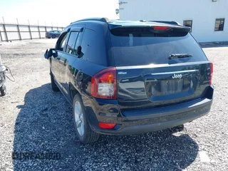 2014 Jeep Compass Sport with VIN 1C4NJCBA0ED510942, listed as a IAAI auction lot 41952596 with 196,030 mi miles and . Bid and sale history available at DreamBid. Image 3.