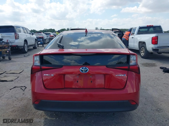 2021 Toyota Prius L Eco with VIN JTDKAMFU6M3148195, listed as a IAAI auction lot 41801369 with 130,601 mi miles. Bid and sale history available at carsss.com. Image 17.