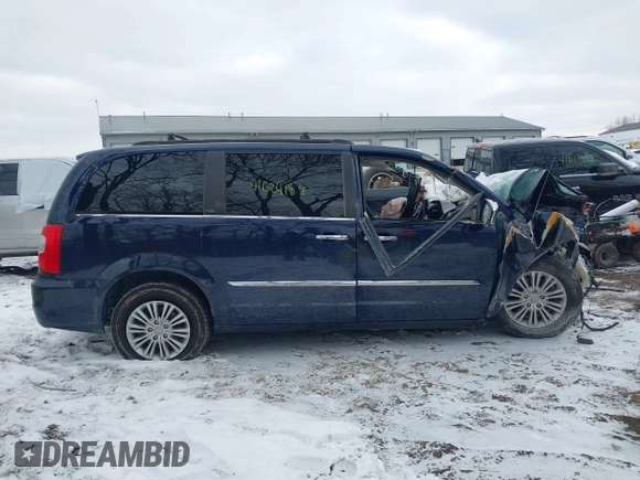 2015 Chrysler Town & Country Touring L with VIN 2C4RC1CG5FR573973, listed as a IAAI auction lot 41624188 with Not Provided miles and . Bid and sale history available at carsss.com. Image 14.