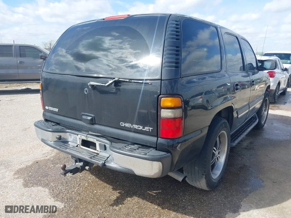 2004 Chevrolet Tahoe LT with VIN 1GNEC13Z74J323109, listed as a IAAI auction lot 41829422 with 261,636 mi miles. Bid and sale history available at carsss.com. Image 4.