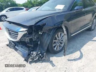 2021 Mazda CX-9 Carbon Edition z VIN JM3TCBDY7M0536005, wystawiony jako IAAI lot #42424129 z przebiegiem 48 005 mil mil oraz . Historia ofert i sprzedaży dostępna na DreamBid. Obrazek 18.