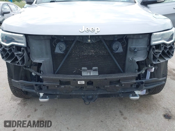 2018 Jeep Grand Cherokee Limited with VIN 1C4RJFBG7JC266715, listed as a IAAI auction lot 42562005 with 101,999 mi miles and . Bid and sale history available at DreamBid. Image 6.