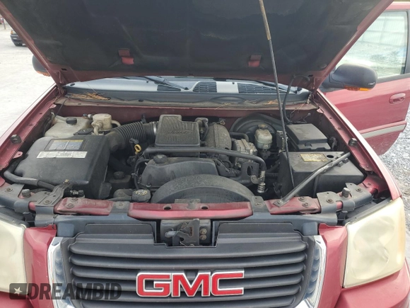 2003 GMC Envoy SLE z VIN 1GKDS13S632143174, wystawiony jako Copart lot #81514914 z przebiegiem Nie podano mil oraz Szkoda całkowita • Salvage title. Historia ofert i sprzedaży dostępna na DreamBid. Obrazek 12.