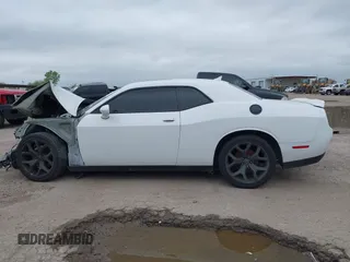 2015 Dodge Challenger SXT Plus z VIN 2C3CDZBG9FH894976, wystawiony jako IAAI lot #39188506 z przebiegiem 103 501 mil mil oraz . Historia ofert i sprzedaży dostępna na DreamBid. Obrazek 14.
