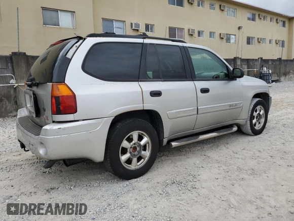 2005 GMC Envoy SLT with VIN 1GKDS13S352101385, listed as a Copart auction lot 89271025 with 165,670 mi miles and Salvage Title. Bid and sale history available at carsss.com. Image 3.