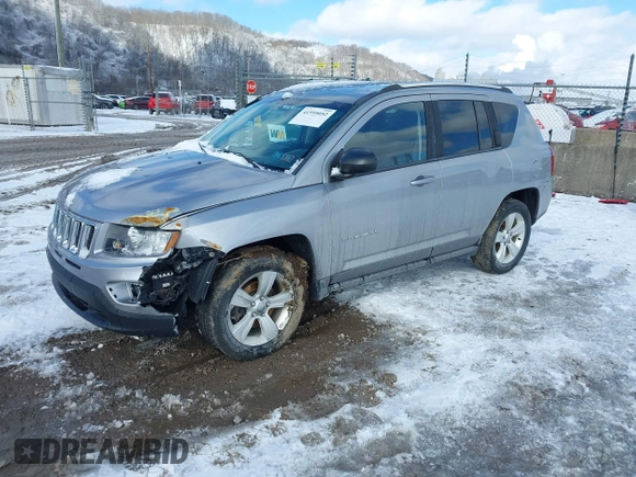 2015 Jeep Compass Sport with VIN 1C4NJDBB1FD206616, listed as a IAAI auction lot 41595052 with 112,836 mi miles. Bid and sale history available at carsss.com. Image 2.