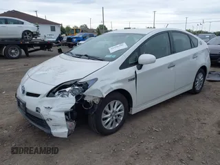 2012 Toyota Prius z VIN JTDKN3DP8C3016162, wystawiony jako IAAI lot #42256101 z przebiegiem 182 308 mil mil oraz . Historia ofert i sprzedaży dostępna na DreamBid. Obrazek 16.