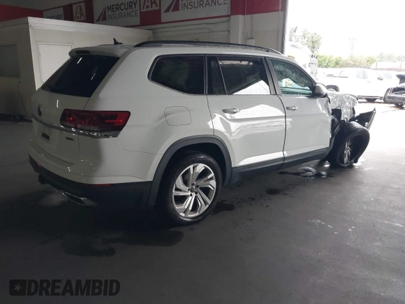 2021 Volkswagen Atlas 3.6L V6 SE w/Technology with VIN 1V2KR2CA8MC501445, listed as a IAAI auction lot 41798934 with 74,764 mi miles. Bid and sale history available at carsss.com. Image 4.