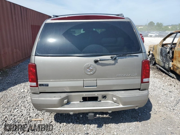 2003 Cadillac Escalade z VIN 1GYEC63T83R157632, wystawiony jako Copart lot #54950564 z przebiegiem 88 527 mil mil oraz Szkoda całkowita • Salvage title. Historia ofert i sprzedaży dostępna na DreamBid. Obrazek 6.
