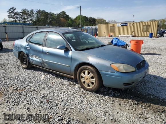 2005 Ford Taurus SEL with VIN 1FAFP56215A234943, listed as a Copart auction lot 51486595 with 222,307 mi miles and Salvage Title. Bid and sale history available at DreamBid. Image 4.