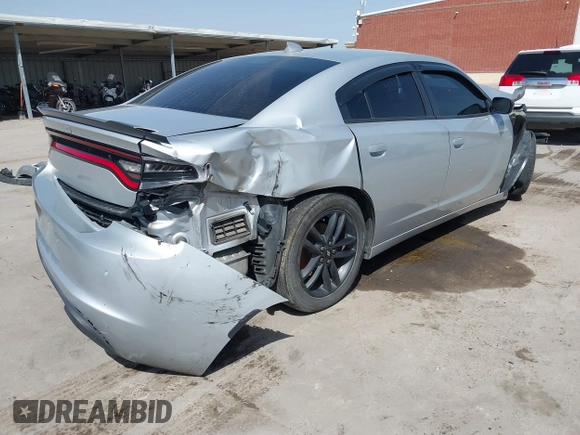 2019 Dodge Charger SXT with VIN 2C3CDXJGXKH706854, listed as a IAAI auction lot 41805578 with 60,240 mi miles and . Bid and sale history available at DreamBid. Image 4.