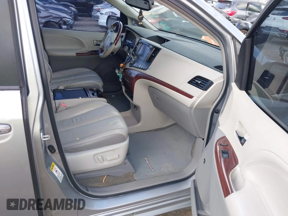 2011 Toyota Sienna XLE AAS with VIN 5TDYK3DC8BS157794, listed as a IAAI auction lot 40759823 with 211,716 mi miles and . Bid and sale history available at DreamBid. Image 5.