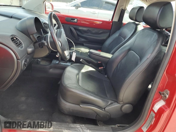 2009 Volkswagen New Beetle Coupe S with VIN 3VWPW31C09M512338, listed as a Copart auction lot 52140795 with 150,986 mi miles and Salvage Title. Bid and sale history available at carsss.com. Image 7.