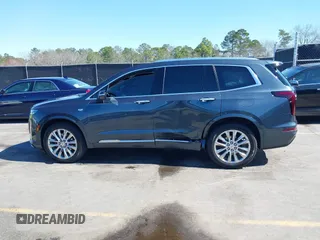2021 Cadillac XT6 Premium Luxury with VIN 1GYKPERS0MZ110029, listed as a IAAI auction lot 41669104 with 58,890 mi miles and . Bid and sale history available at DreamBid. Image 14.