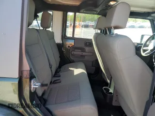 2008 Jeep Wrangler Unlimited Sahara with VIN 1J4GA59148L504608, listed as a Copart auction lot 52400325 with 123,959 mi miles and Salvage Title. Bid and sale history available at carsss.com. Image 12.