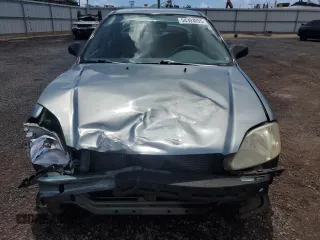 2000 Honda Civic VP z VIN 2HGEJ661XYH589010, wystawiony jako Copart lot #54393055 z przebiegiem 163 724 mil mil oraz Szkoda całkowita • Salvage title. Historia ofert i sprzedaży dostępna na DreamBid. Obrazek 5.