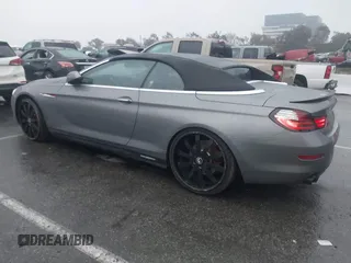 2012 BMW 6 Series 650i with VIN WBALZ3C5XCDL70748, listed as a IAAI auction lot 41502640 with 102,519 mi miles. Bid and sale history available at carsss.com. Image 14.