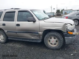 2001 Chevrolet Tahoe LS with VIN 1GNEK13T11R109826, listed as a IAAI auction lot 41473357 with 257,335 mi miles. Bid and sale history available at carsss.com. Image 6.