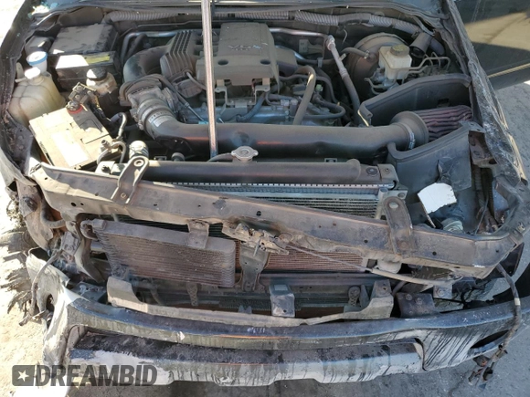 2010 Nissan Frontier LE with VIN 1N6AD0EV5AC446672, listed as a Copart auction lot 89176925 with 107,171 mi miles and Salvage title. Bid and sale history available at DreamBid. Image 11.